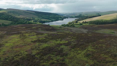 Aerial-pullback-shot-of-Errwood-reservoir-at-peak-district-in-England