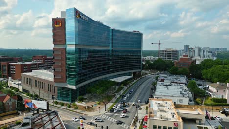 Modern-Piedmont-Hospital-Building-with-mirrored-facade-and-traffic-on-street