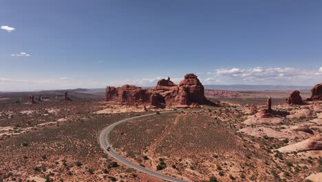 Aerial-view-of-expansive-red-rock-formations-near-Moab,-Utah,-highlighting-the-majestic-and-desolate-desert-landscape