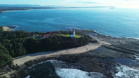 Landscape-of-Norah-Head-lighthouse-building-beacon-coastline-rocky-headland-hill-of-Central-Coast-travel-tourism-holidays-Noraville-Toukley-bay-point-Australia