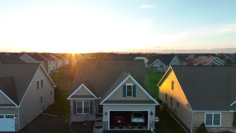 Parking-cars-in-garage-of-modern-housing-area-during-golden-sunset