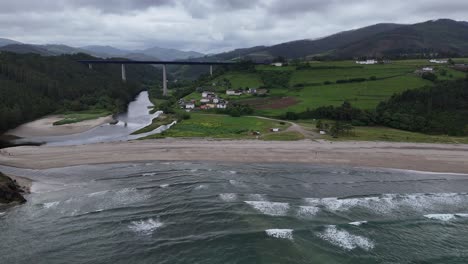 Waves-breaking-on-Cueva,-beach-Spain-drone,aerial