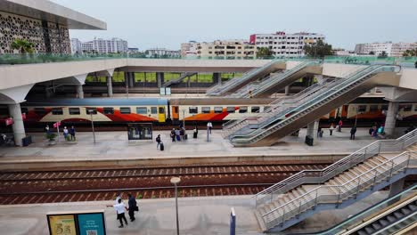 Train-station-in-Casablanca,-Morocco-train-leaving-the-station,-rail-transportation