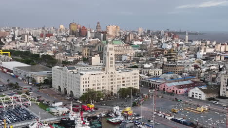 Aerial-View-of-Montevideo-Uruguay-Port,-Customs-Building-and-Cityscape-Skyline,-Drone-Shot