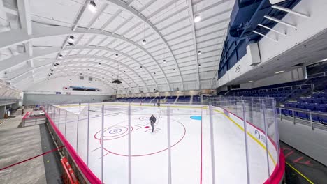 Wide-angle-view-of-New-Ice-being-laid-down-in-the-1932-Olympic-Hockey-Arena-Rink-in-Lake-Placid,-New-York