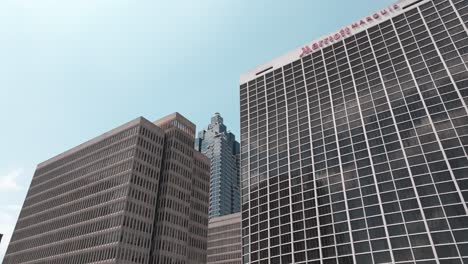 Looking-up-at-Downtown-Atlanta-skyscrapers-Truist-Plaza-and-Marriot-Marquis-skyline-building-at-Peachtree-Center