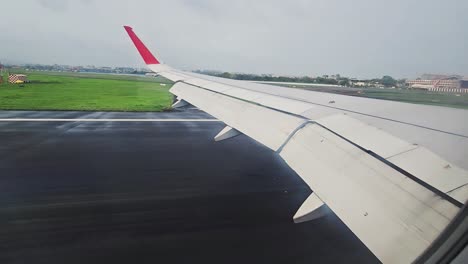 Commercial-Airplane-Window-View-at-high-altitude