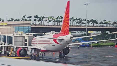 Airplane-window-view-in-big-Mumbai-city