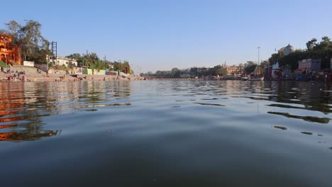 pristine-holy-Shipra-river-with-bright-blue-sky-at-morning-from-low-angle