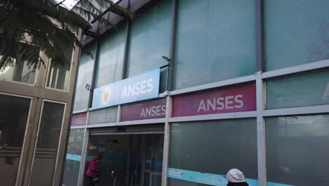 Establishing-shot-of-Anses-Social-security-office-of-Argentine-people-street-in-winter