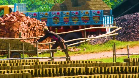 Workers-At-The-Brick-Field-In-Sylhet,-Bangladesh---Wide-Shot