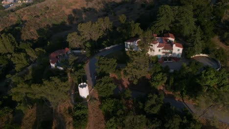 Aerial-view-circling-the-William-S-Hart-Museum,-golden-hour-in-Santa-Clarita,-USA