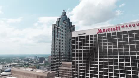 Tallest-skyscraper-Truist-Plaza-alongside-the-Marriot-Marquis-skyline-hotel-building-at-Peachtree-Street-in-Downtown-Atlanta