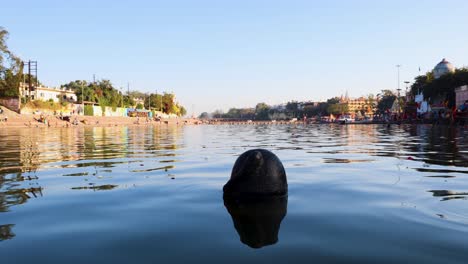 pristine-holy-Shipra-river-with-bright-blue-sky-at-morning-from-low-angle