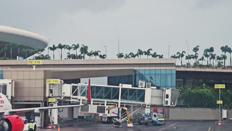 wing-and-engine-of-an-airplane-flying-over-Mumbai-city