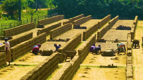 Group-of-workers-making-a-manual-brickwork-in-a-poor-area-of-South-Asia