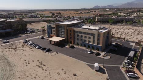 Cinematic-Establishing-Drone-Shot-Above-Holiday-Inn-and-Suites-Hotel-Chain