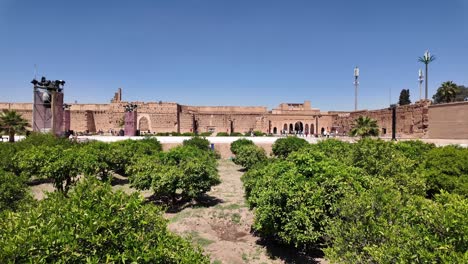 Badi-Palace-interior-argan-tree-plantation,-famous-Morocco-movies-set,-Marrakesh