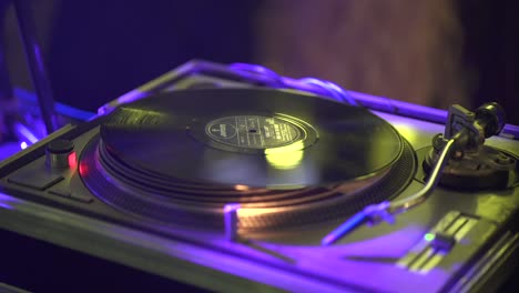 Preparing-a-Vinyl-Records-on-Player-Plate-at-the-Disco,-Close-Up