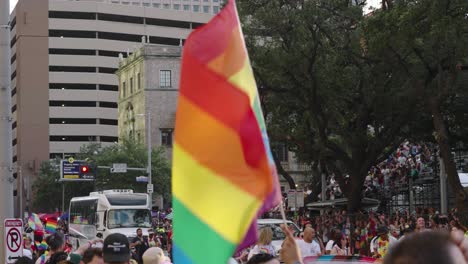 Large-Pride-flag-on-display-at-Pride-parade-in-downtown-Houston,-Texas