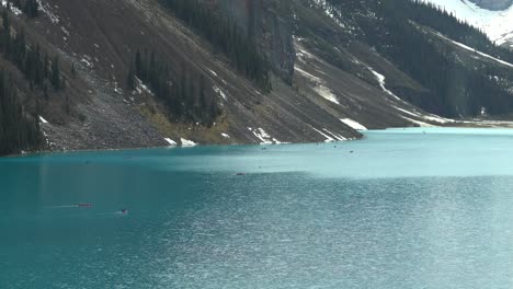 Red-Canoes-On-Lake-Louise;-Banff,-Alberta,-Canada