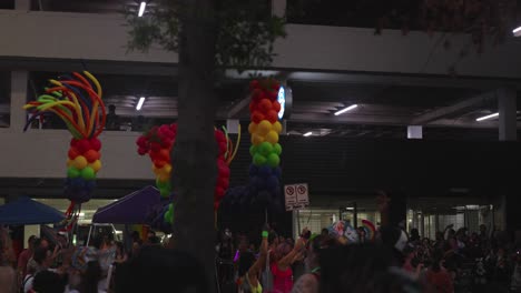 Pride-parade-and-celebration-at-night-in-Houston,-Texas