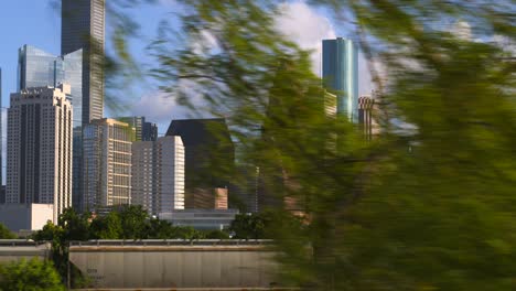 Drone-shot-of-downtown-Houston,-Texas-moving-to-the-left