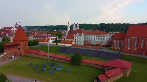 Aerial-Kaunas,-Lithuania,-skyline-old-town-and-church,-buildings-by-drone