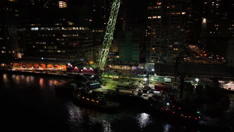 Aerial-view-of-the-Weeks-533-Barge-Mounted-Heavy-Crane-at-Lenox-hill-night-in-NY