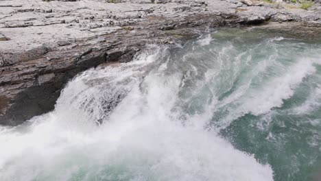 Close-Up-of-River-Waterfall-in-the-Forest-in-Glacier-National-Park-in-Montana-in-Summer