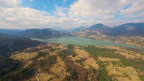 Aerial-view-over-Colibita-lake-on-a-beautiful-sunny-day