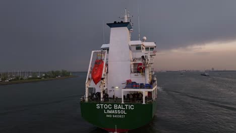 Rear-View-Of-Stoc-Baltic-Chemical-And-Oil-Tanker-Cruising-On-Holland-Diep-On-Cloudy-Sunset