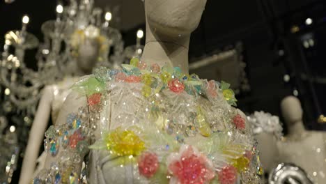 Close-up-view-of-a-stunning-haute-couture-dress-adorned-with-intricate-floral-embroidery-and-sparkling-crystals-at-Dolce-And-Gabbana-Exhibition