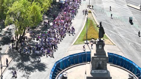 Aerial-Shot-Of-8m-Demonstration-In-Paseo-De-La-Reforma-Near-Cuauhtemoc-Monument