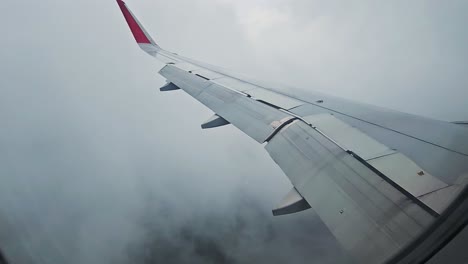 View-from-the-window-of-the-plane-in-showing-big-Mumbai-city