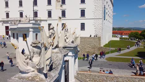 Entrance-Gate-Bratislava-Castle-with-Tourists-Visiting,-Slovakia,-Aerial