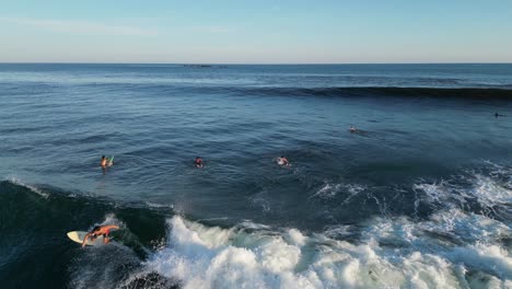 High-angle-view-as-local-surfer-catches-ocean-wave-at-Chacahua-Beach