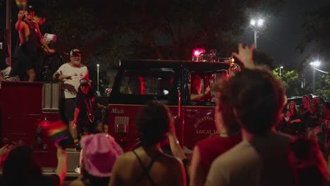 Pride-parade-and-celebration-at-night-in-Houston,-Texas