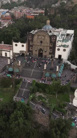 Old-church-on-the-hill-at-the-Basilica-of-Guadalupe,-Mexico-City,-vertical-mode