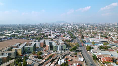 Aerial-Establishing-Daylight,-Santiago-de-Chile-City-Andean-Mountain-Background