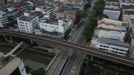 Aerial-view-of-a-bridge-passing-through-city-of-Kuala-Lumpur-in-Malaysia