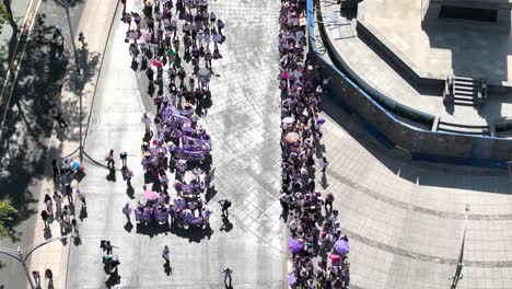 Aerial-drone-shot-of-organized-woman’s-demonstration-day