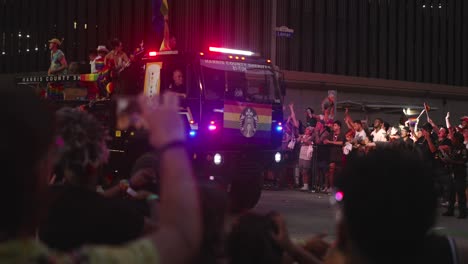 Pride-parade-and-celebration-at-night-in-Houston,-Texas