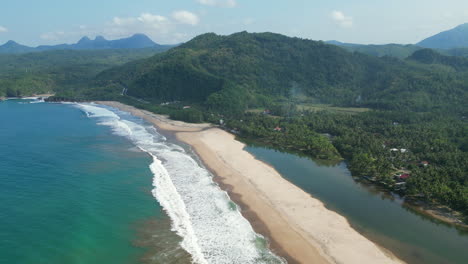 Pan-Up-Over-Pantai-Soge-Beach-And-Mountain-Ranges-Java-Indonesia