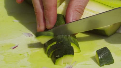 Male-Hands-Cutting-Organic-Healthy-Courgette-Zucchini-Outside-on-Chopping-Board---4K-Slow-Motion-Meal-Food-Preparation-Clip