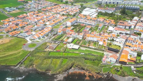 Vila-franca-islet-and-coastal-town-in-sao-miguel,-azores-on-a-sunny-day,-aerial-view