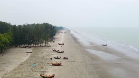 Fishing-Boats-At-Kuakata-Sea-Beach-In-Bangladesh---Aerial-Drone-Shot