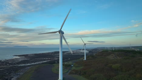 Wind-turbines-turning-at-golden-hour-on-Solway-Firth-coast