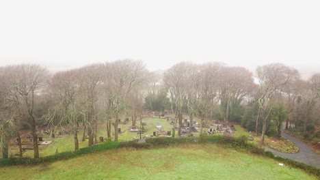 Wide-aerial-dolly-of-Menlo-graveyard-on-a-foggy-day