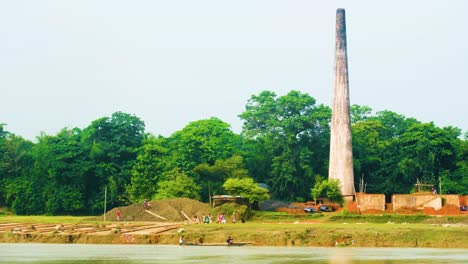 Riverside-brick-construction-in-rural-area-of-Surma-river,-Bangladesh